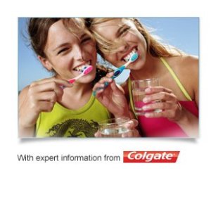 Two young women brushing their teeth